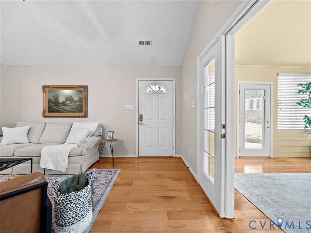 1338 Tannery Circle Midlothian, VA 23113 - Photo 6 of 37 a bedroom with furniture and a rug