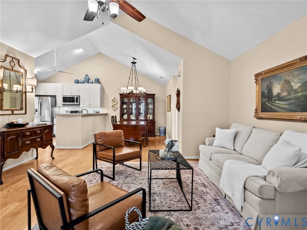 1338 Tannery Circle Midlothian, VA 23113 - Photo 8 of 37 a living room with furniture and a wooden floor