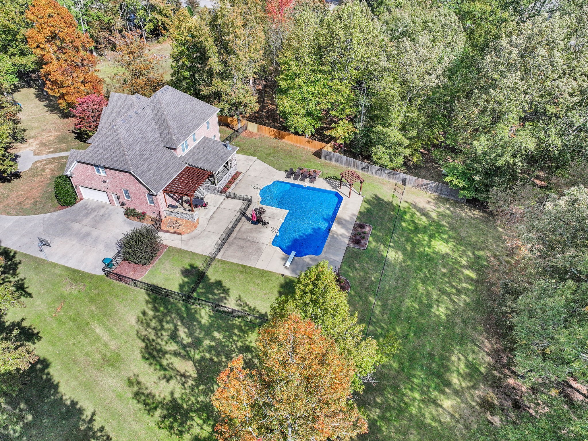 an aerial view of residential house with outdoor space