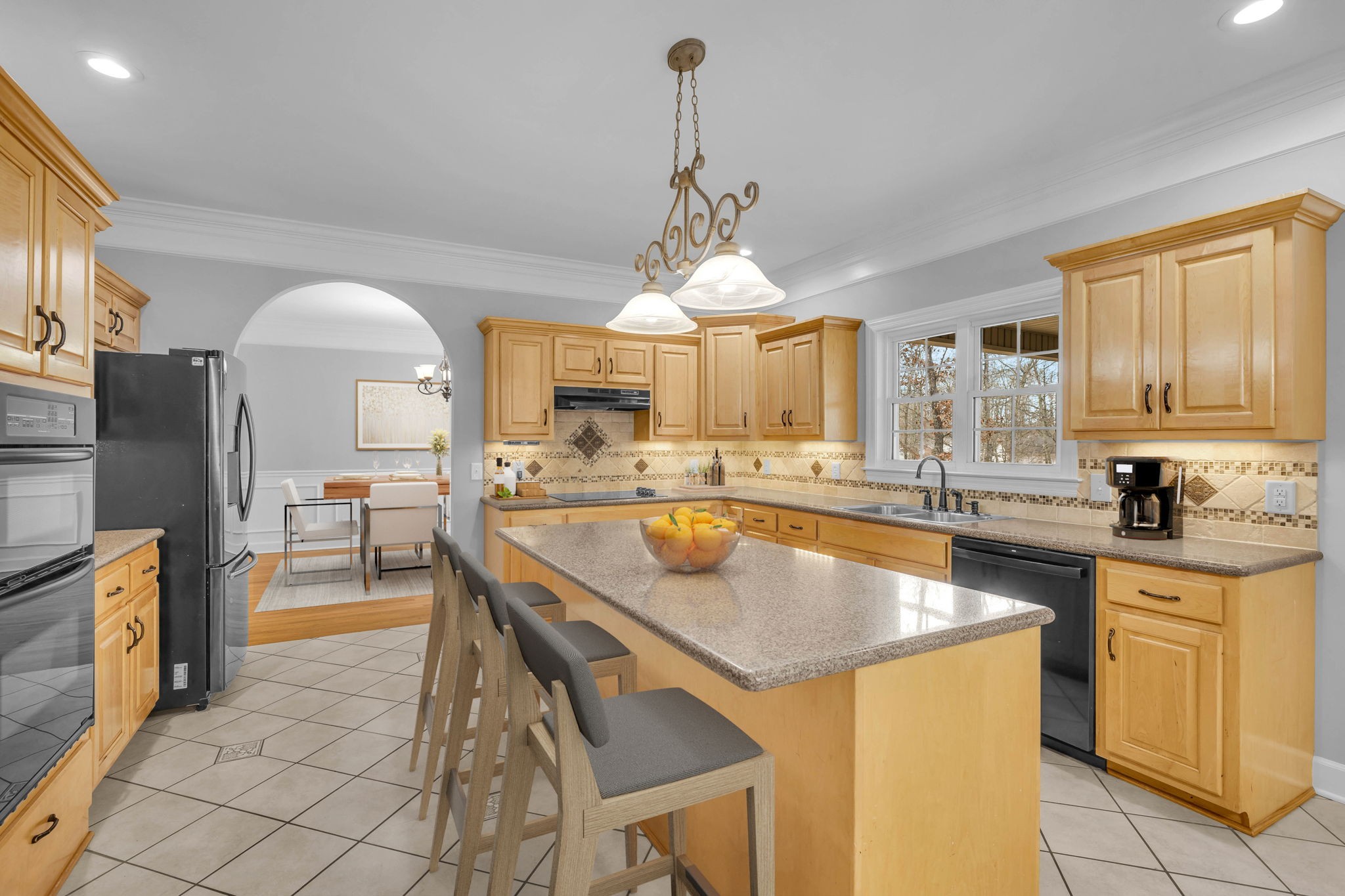 1273 Cedar Grove Road Lebanon, TN 37087 - Photo 13 of 52 a kitchen with stainless steel appliances granite countertop a sink a stove and refrigerator