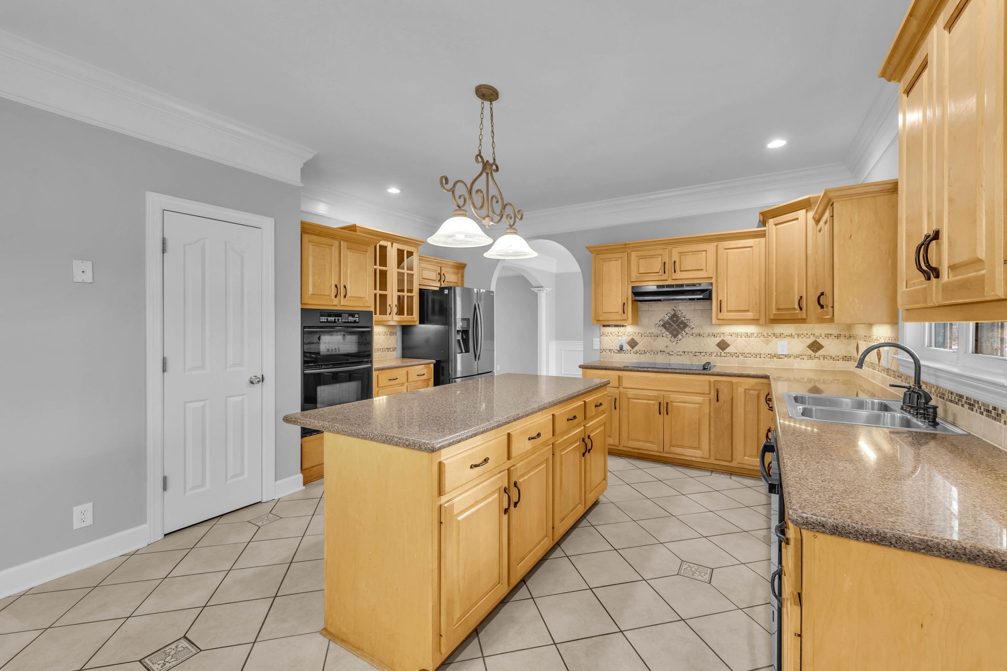 1273 Cedar Grove Road Lebanon, TN 37087 - Photo 16 of 52 a open kitchen with kitchen island granite countertop a sink cabinets and stainless steel appliances