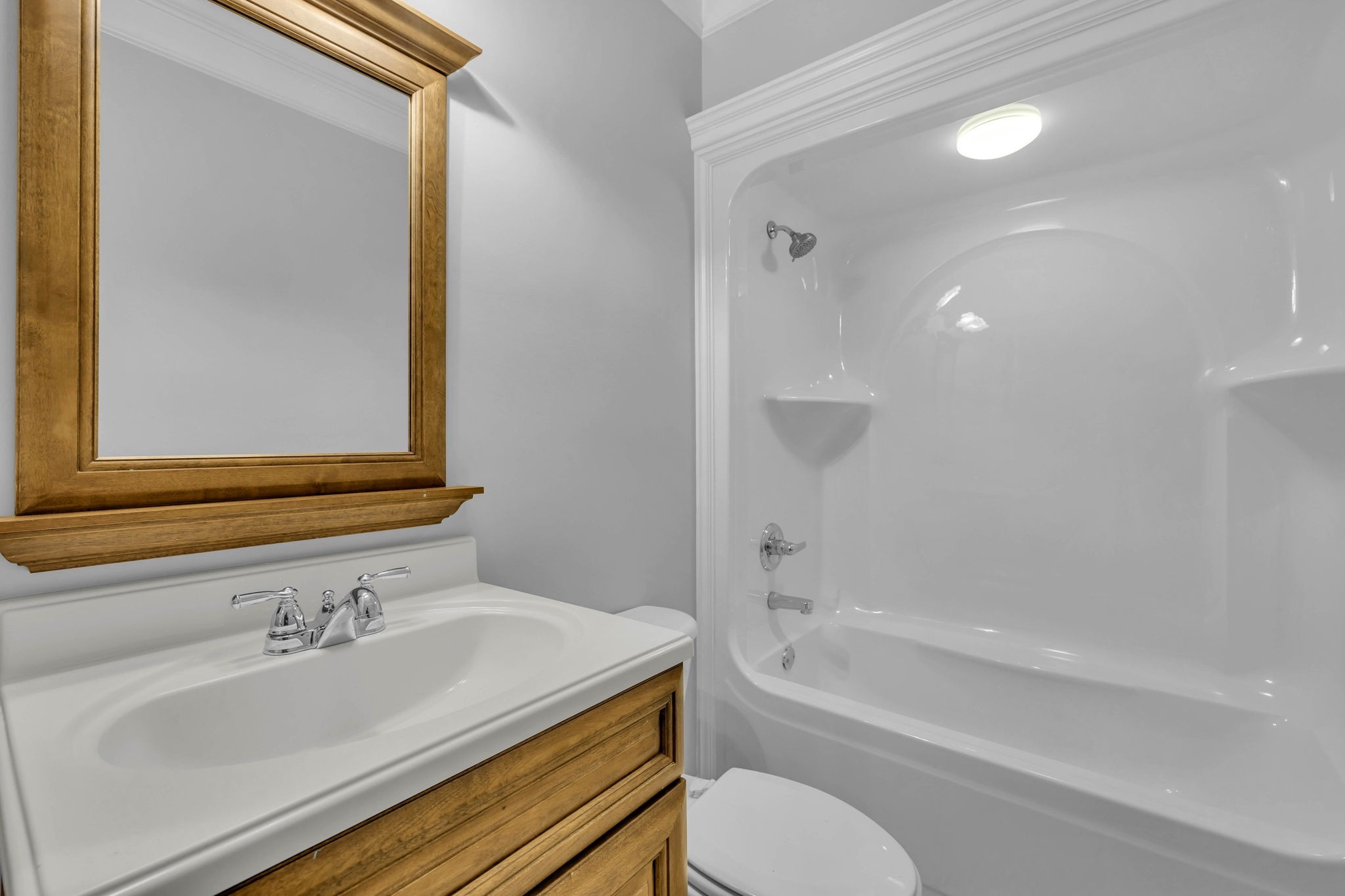 1273 Cedar Grove Road Lebanon, TN 37087 - Photo 22 of 52 a bathroom with a bathtub and a sink