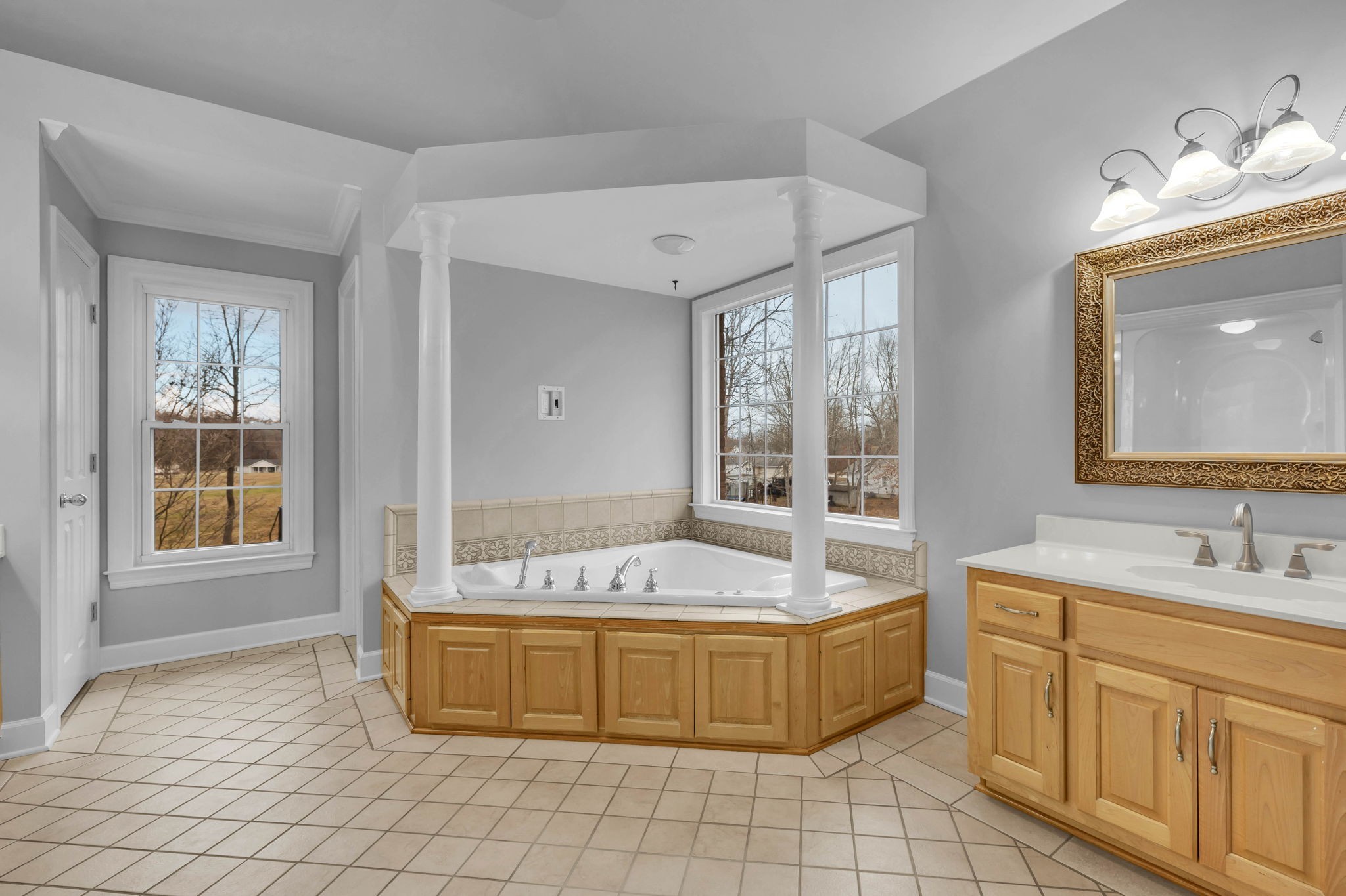 1273 Cedar Grove Road Lebanon, TN 37087 - Photo 26 of 52 a spacious bathroom with a tub sink and mirror