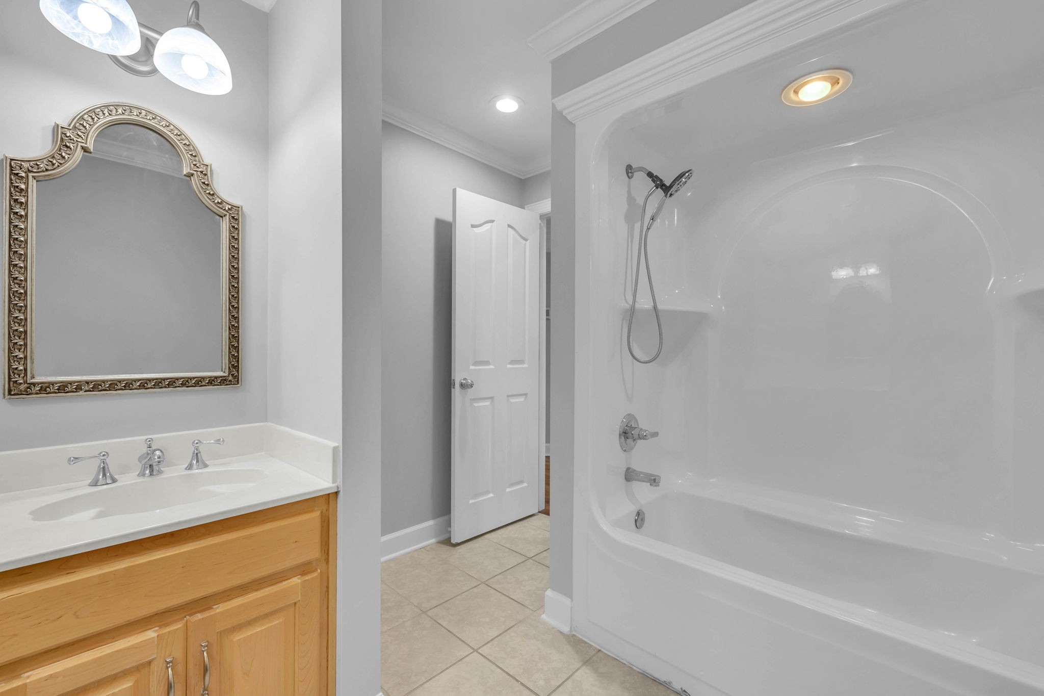 1273 Cedar Grove Road Lebanon, TN 37087 - Photo 32 of 52 a bathroom with a tub sink shower and mirror