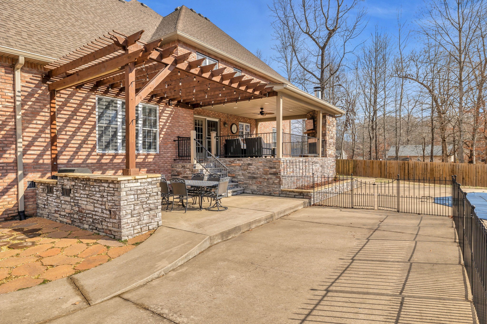 1273 Cedar Grove Road Lebanon, TN 37087 - Photo 40 of 52 a view of a patio with a table and chairs and potted plants