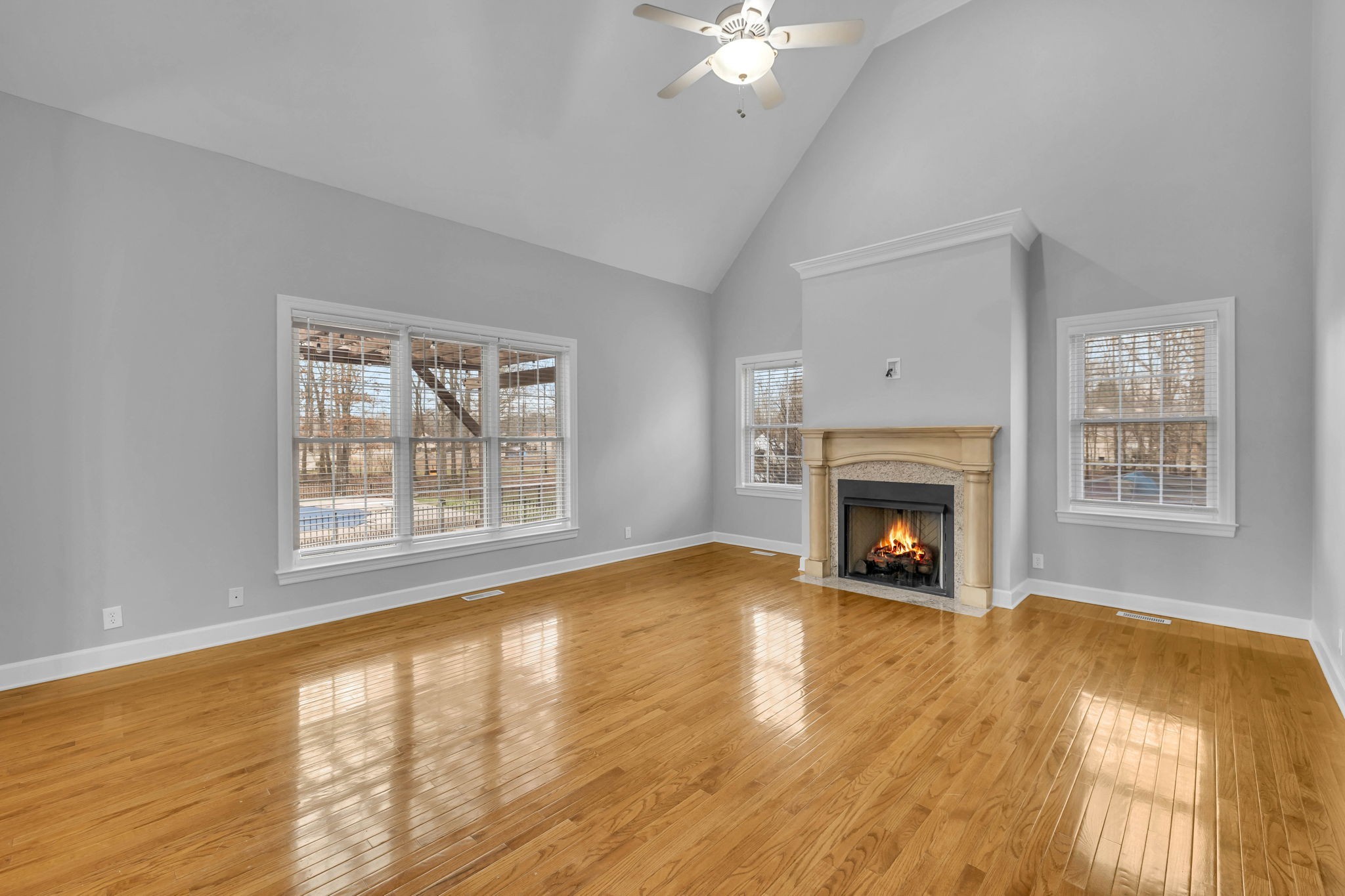1273 Cedar Grove Road Lebanon, TN 37087 - Photo 6 of 52 a view of an empty room with chandelier and a fireplace