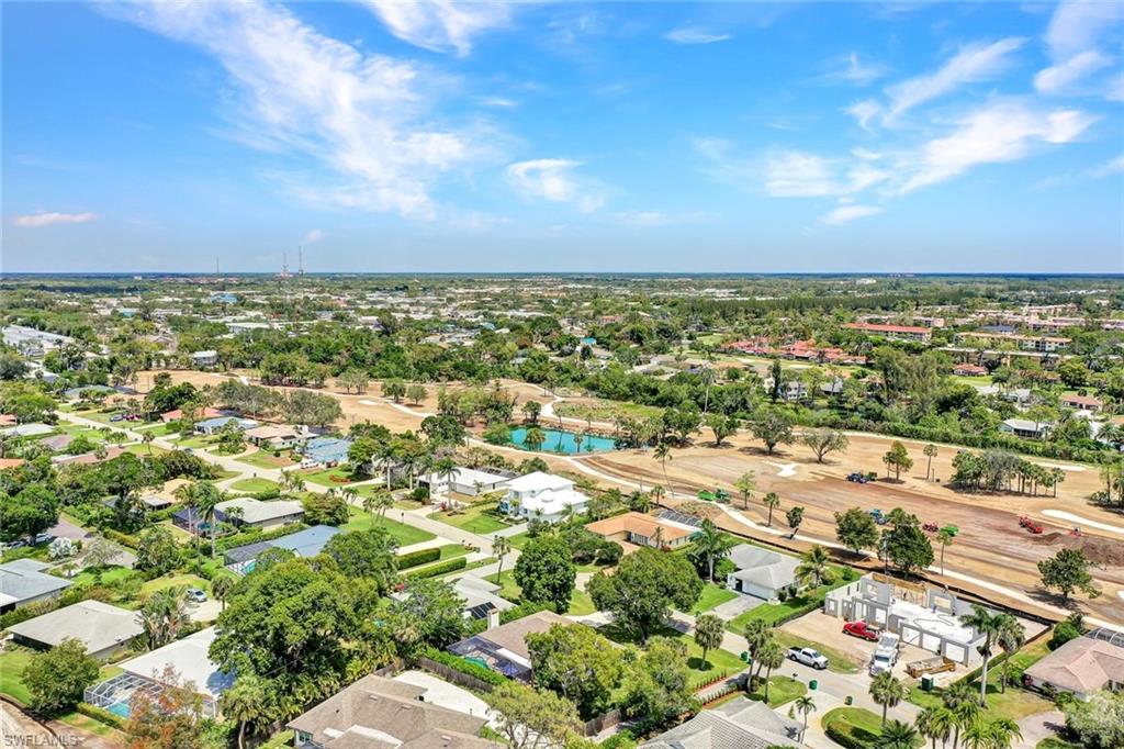 237 Burning Tree Drive Naples, FL 34105 - Photo 24 of 26 a view of a city