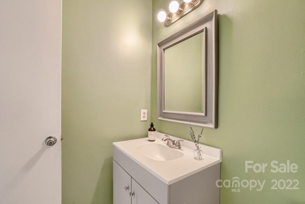 11320 Park Road Charlotte, NC 28226 - Photo 17 of 28 a bathroom with a sink and a mirror