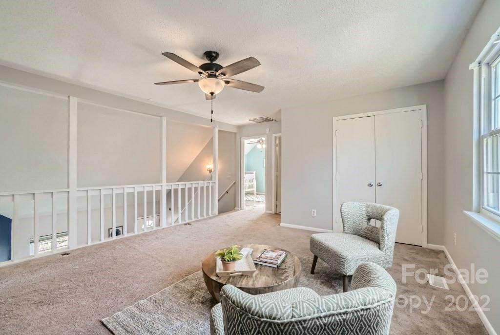 11320 Park Road Charlotte, NC 28226 - Photo 19 of 28 a living room with furniture and a window