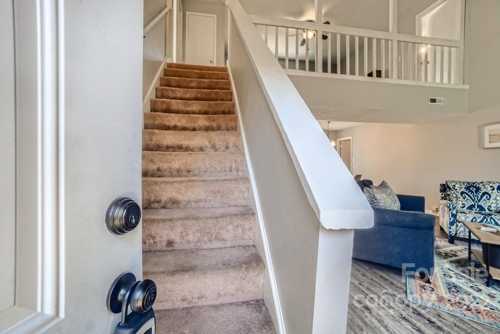 11320 Park Road Charlotte, NC 28226 - Photo 2 of 28 a view of entryway and hall with wooden floor