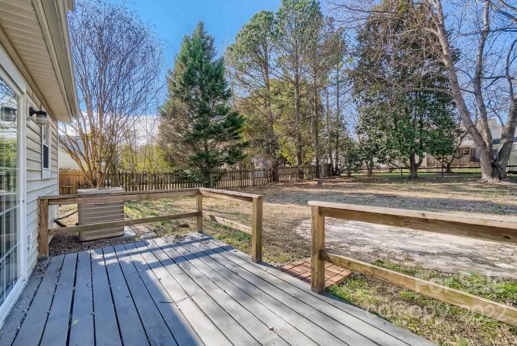 11320 Park Road Charlotte, NC 28226 - Photo 25 of 28 a view of a deck with trees