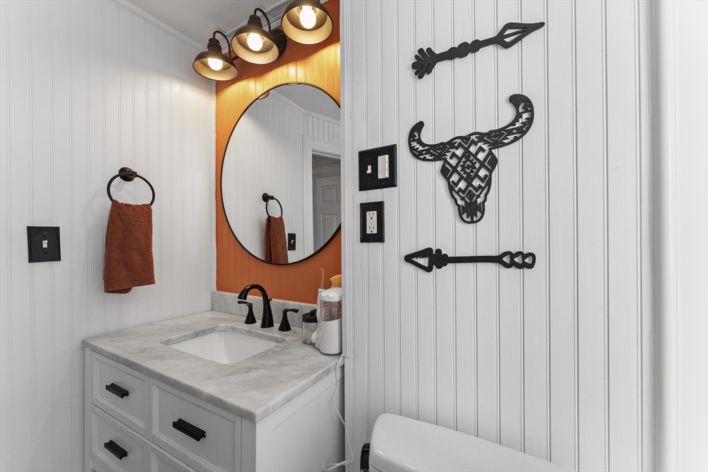 74 Benson Street Whitman, MA 02382 - Photo 18 of 30 a bathroom with a sink mirror and vanity