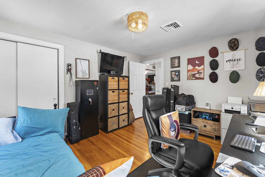74 Benson Street Whitman, MA 02382 - Photo 23 of 30 a view of a workspace with furniture and a window