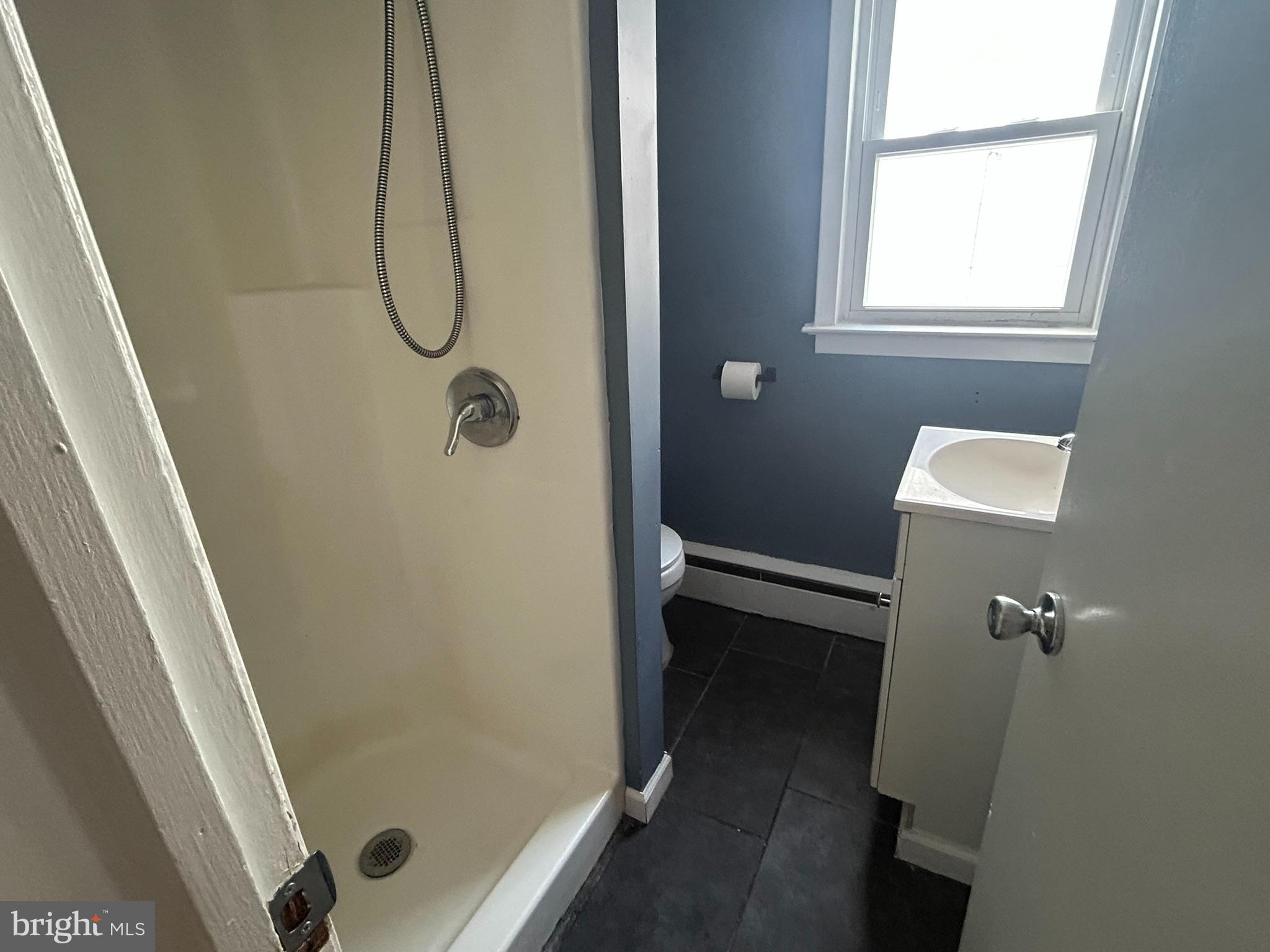 15 Mary Street Pemberton, NJ 08068 - Photo 6 of 7 a bathroom with a glass shower door