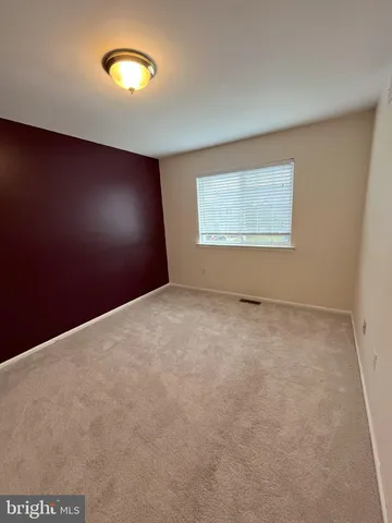 an empty room with closet