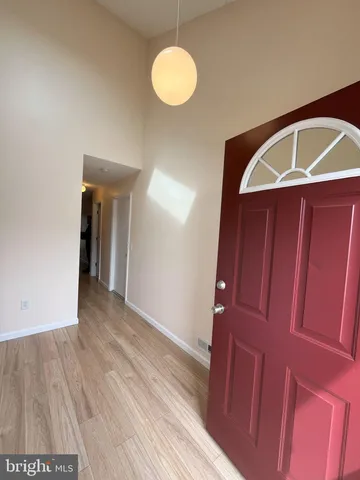 a view of a livingroom with furniture and wooden floor