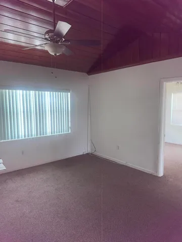 en empty room with windows