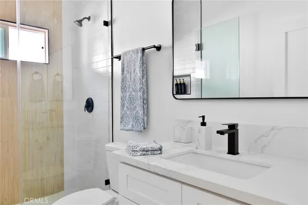 a picture of a wall with a white wall and white cabinet