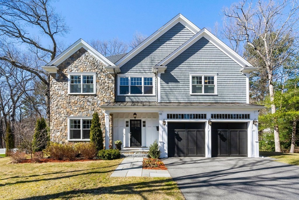 43 MacArthur Road Wellesley, MA 02482 - Photo 1 of 35 front view of a house with a yard