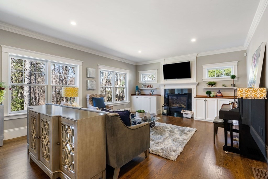 43 MacArthur Road Wellesley, MA 02482 - Photo 15 of 35 a living room with furniture and a fireplace