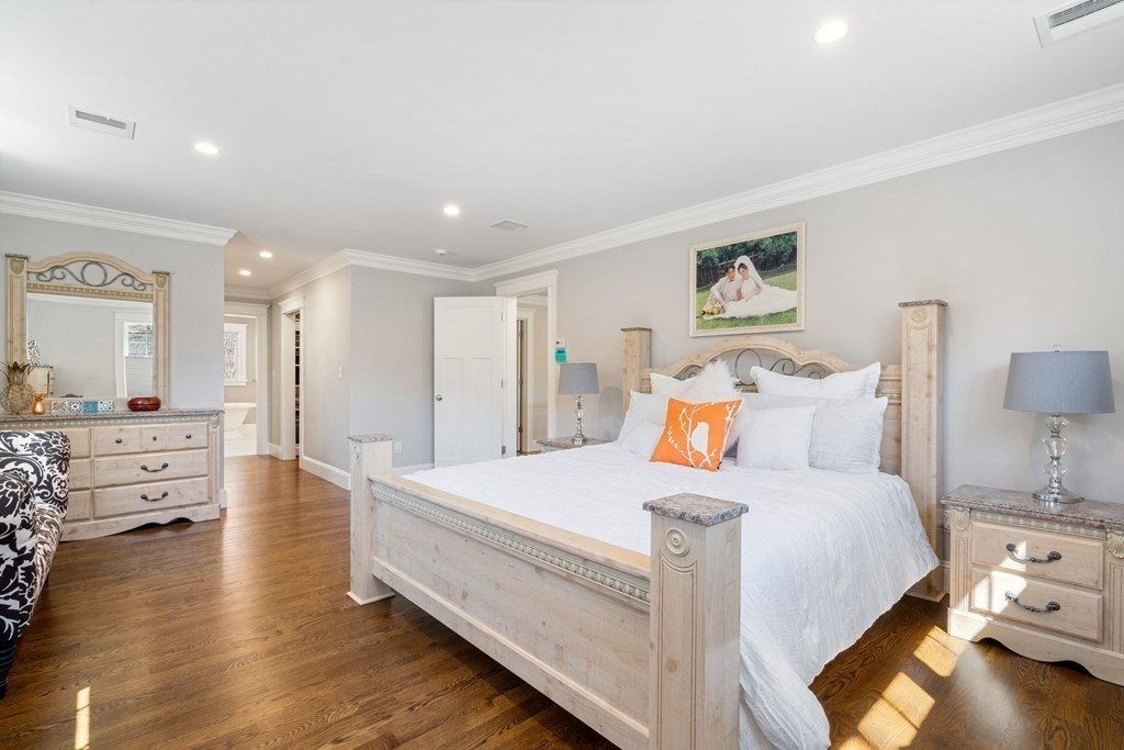 43 MacArthur Road Wellesley, MA 02482 - Photo 19 of 35 a bedroom with a bed and a view of living room