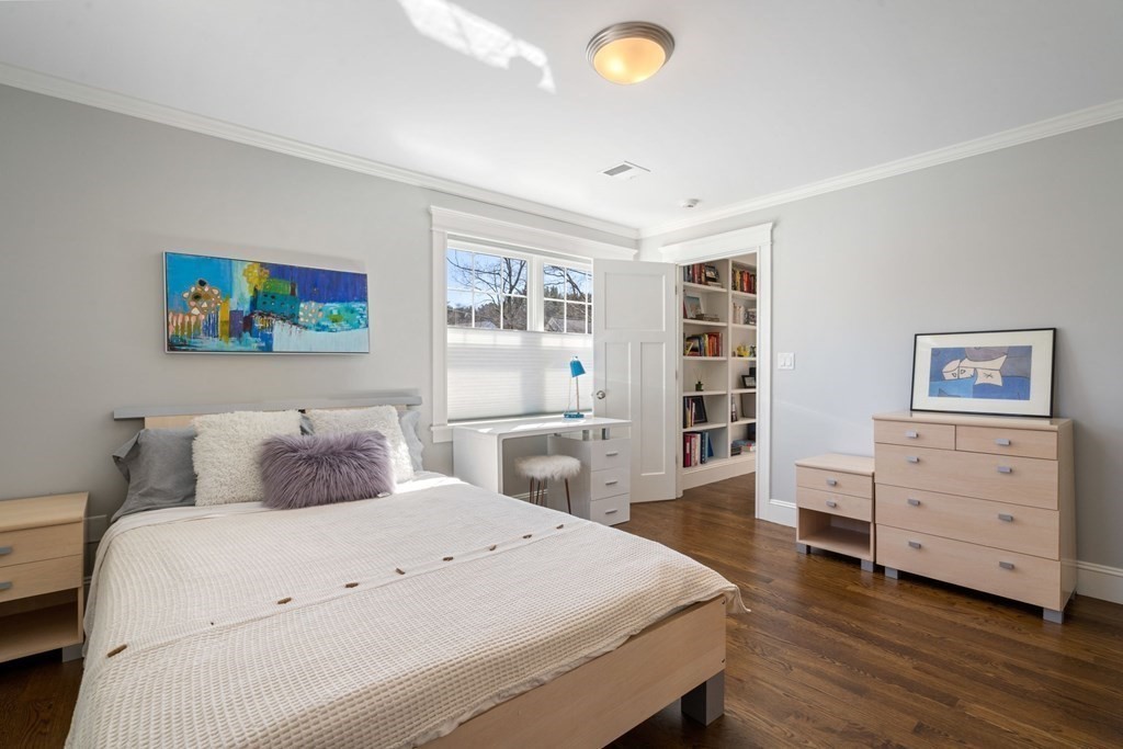 43 MacArthur Road Wellesley, MA 02482 - Photo 24 of 35 a bedroom with a bed and a cabinets