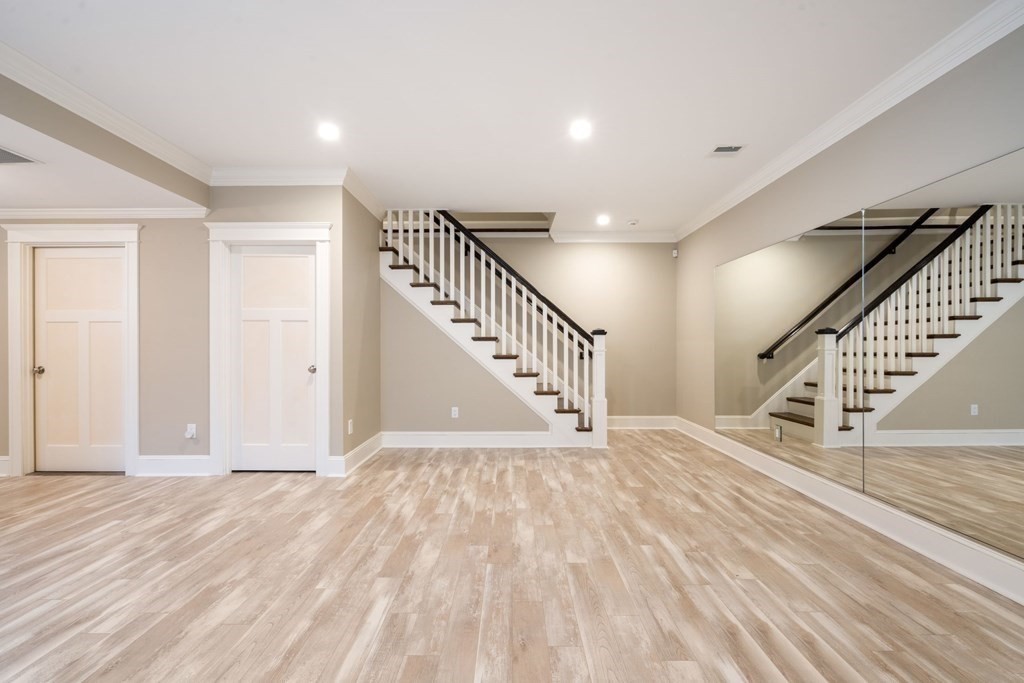 43 MacArthur Road Wellesley, MA 02482 - Photo 26 of 35 a view of entryway with wooden floor