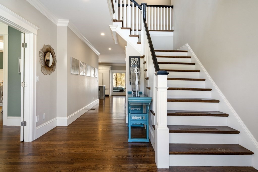 43 MacArthur Road Wellesley, MA 02482 - Photo 3 of 35 a view of entryway and hall with wooden floor