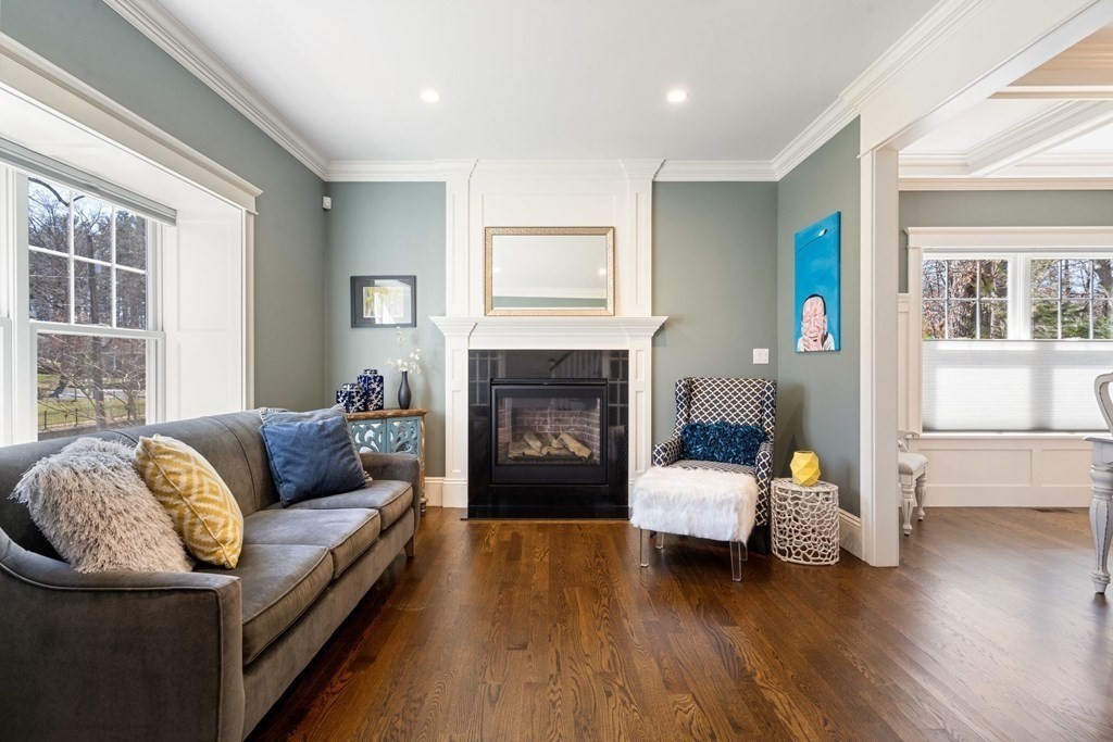 43 MacArthur Road Wellesley, MA 02482 - Photo 4 of 35 a living room with furniture and a fireplace