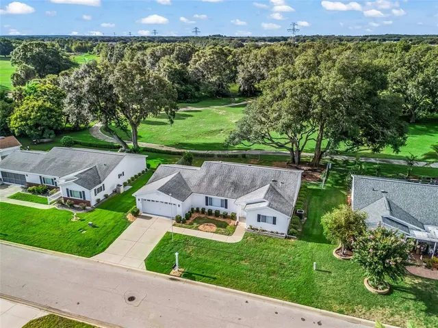 an aerial view of a house with garden