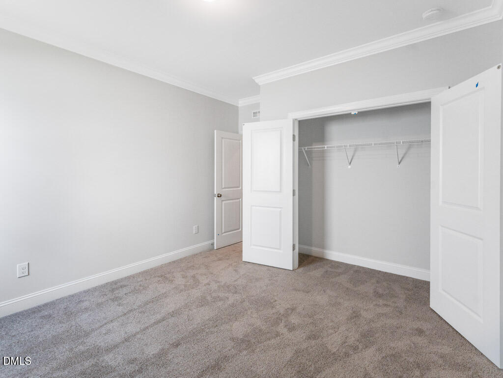 348 Canyon Gap Way Raleigh, NC 27610 - Photo 14 of 33 a view of an empty room