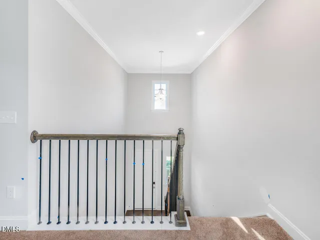 a white bath tub sitting next to a white toilet and sink
