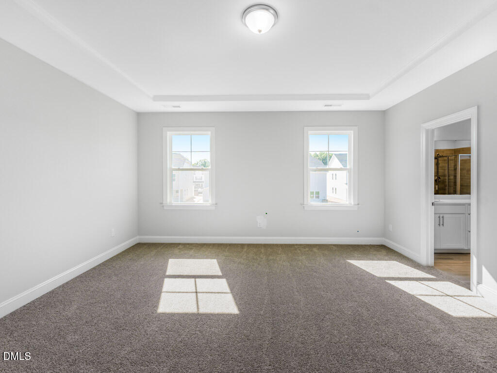 348 Canyon Gap Way Raleigh, NC 27610 - Photo 25 of 33 an empty room with windows
