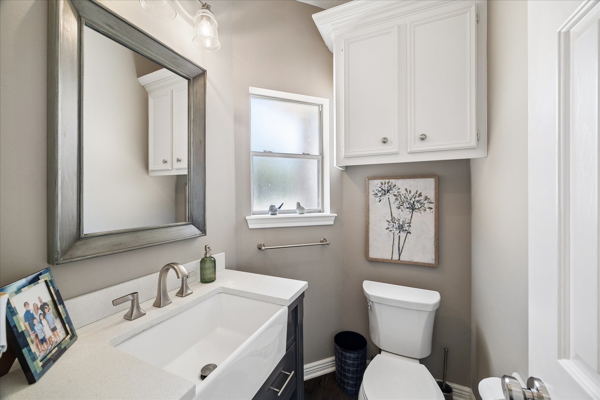 2810 Timber Country Way Kingwood, TX 77345 - Photo 18 of 30 a bathroom with a toilet sink and mirror