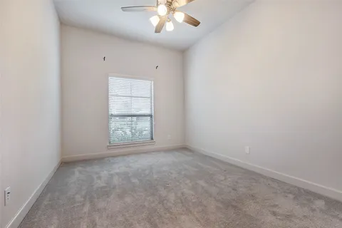 a bathroom with a sink a toilet and vanity