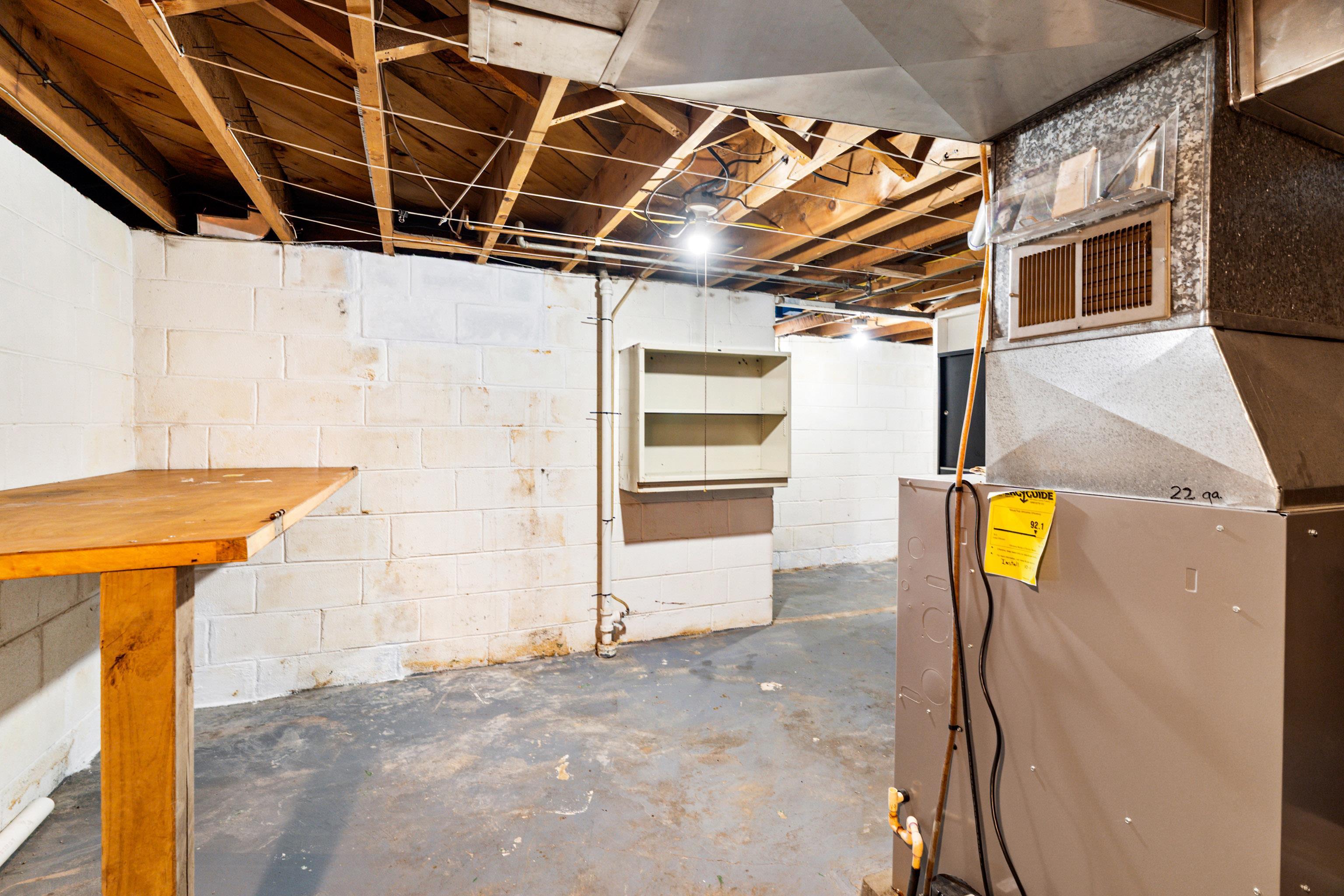 4621 Oneida Street Duluth, MN 55804 - Photo 35 of 47 Unfinished below grade area with heating unit