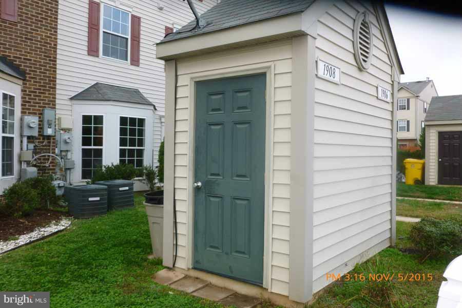 1908 Gardenia Court Odenton, MD 21113 - Photo 2 of 23 a view of a porch with a yard