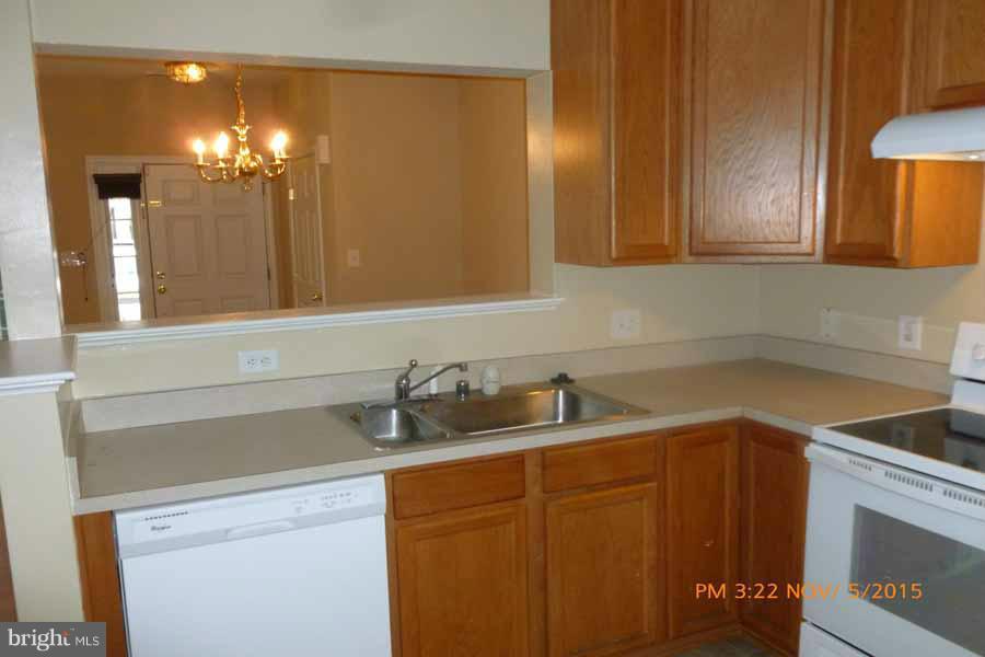 1908 Gardenia Court Odenton, MD 21113 - Photo 9 of 23 a bathroom with a sink and a mirror