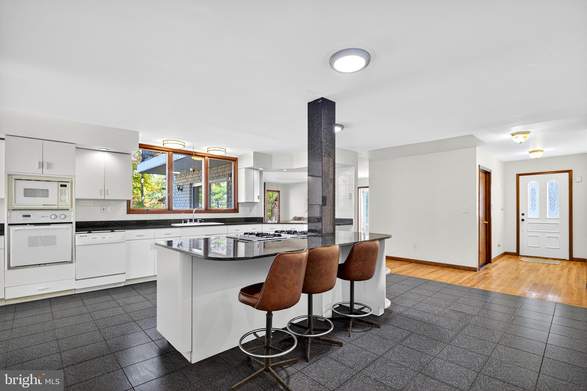 16 Benedek Road Princeton, NJ 08540 - Photo 16 of 60 a kitchen with a sink cabinets and window
