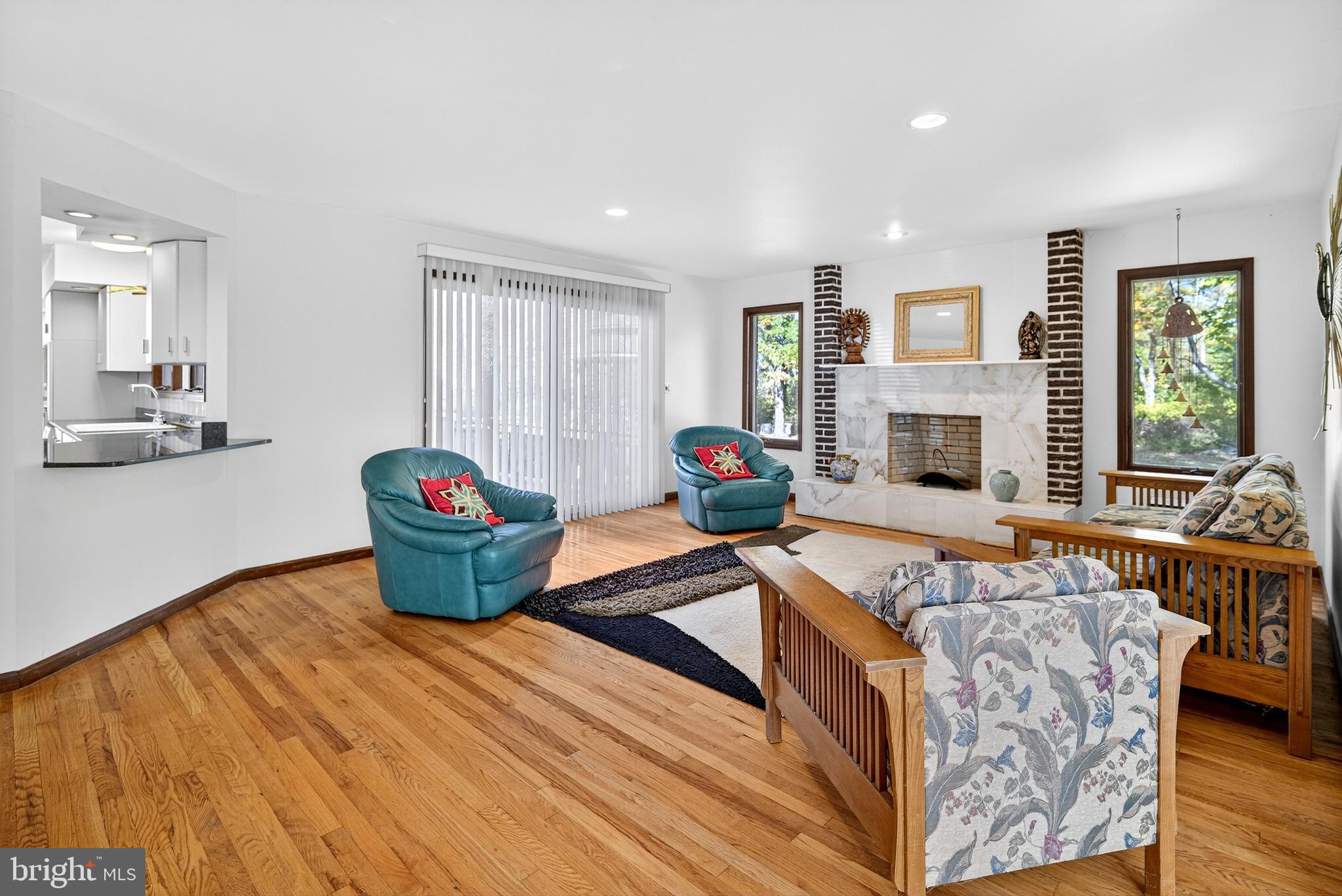 16 Benedek Road Princeton, NJ 08540 - Photo 22 of 60 a living room with furniture stove and a fireplace