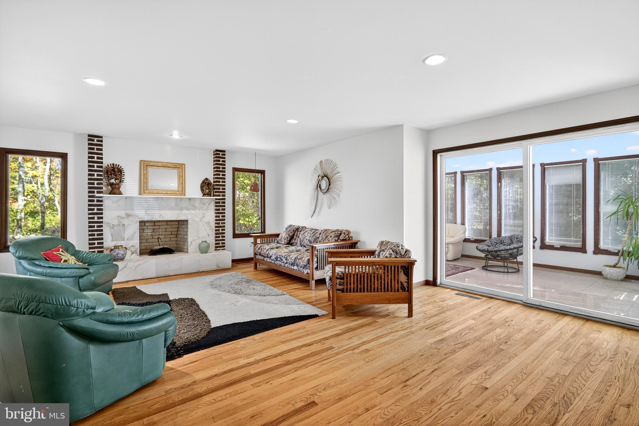 16 Benedek Road Princeton, NJ 08540 - Photo 24 of 60 a living room with furniture and a fireplace