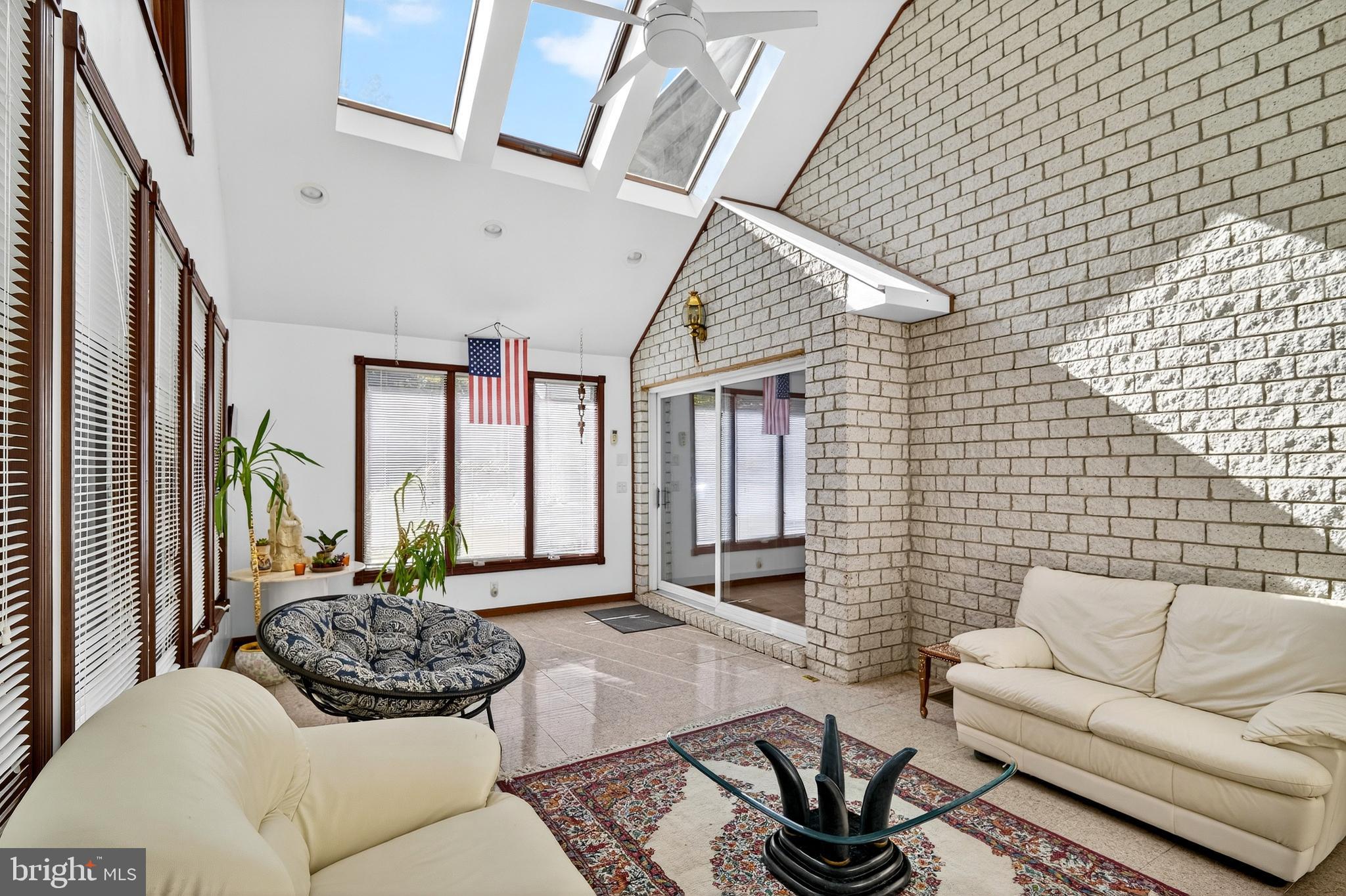 16 Benedek Road Princeton, NJ 08540 - Photo 26 of 60 a living room with furniture and a large window