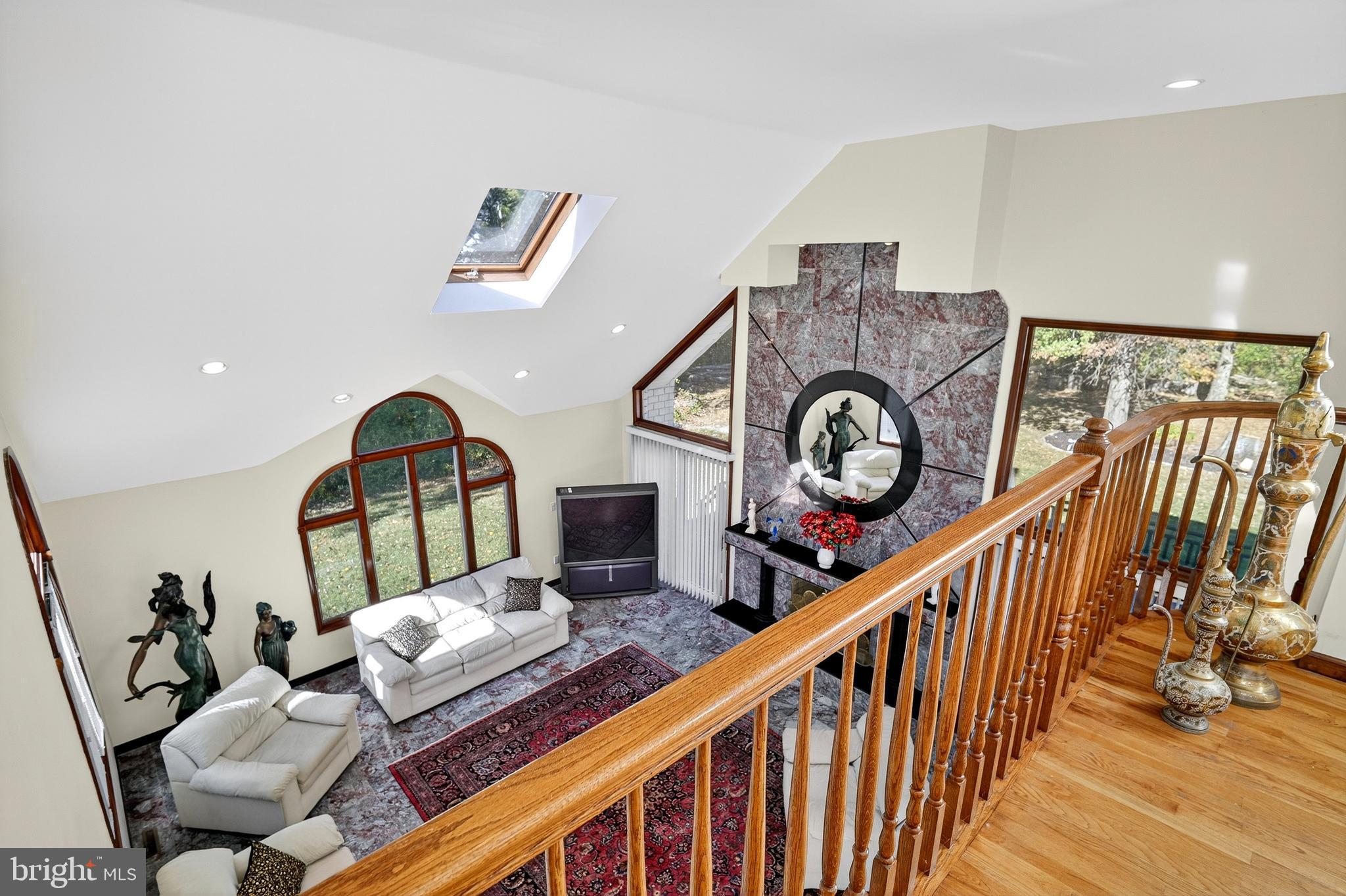 16 Benedek Road Princeton, NJ 08540 - Photo 30 of 60 a view of a livingroom with furniture entryway wooden floor and window