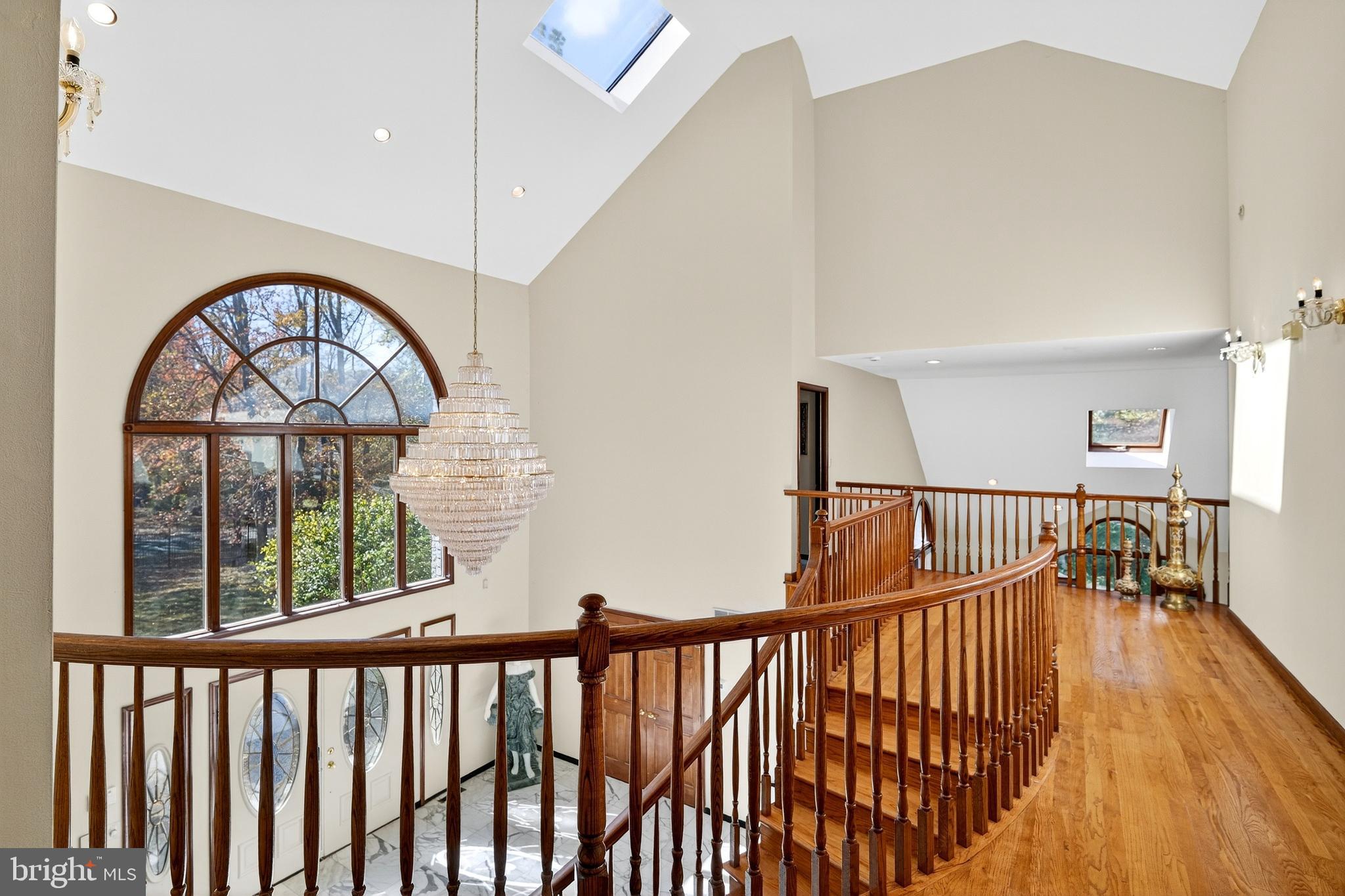 16 Benedek Road Princeton, NJ 08540 - Photo 31 of 60 a view of staircase with railing and a chandelier
