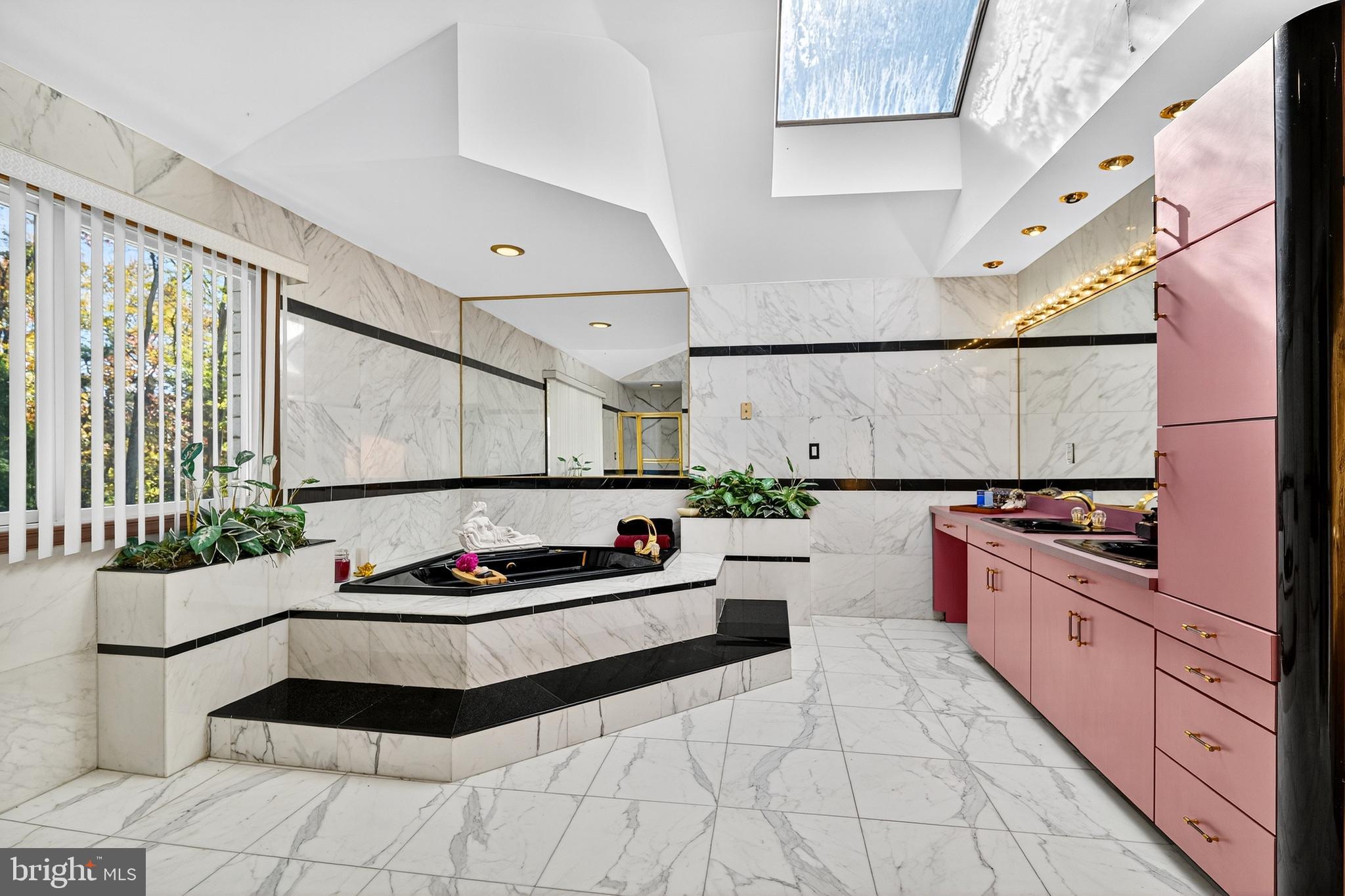 16 Benedek Road Princeton, NJ 08540 - Photo 35 of 60 a kitchen with stainless steel appliances a sink stove and cabinets