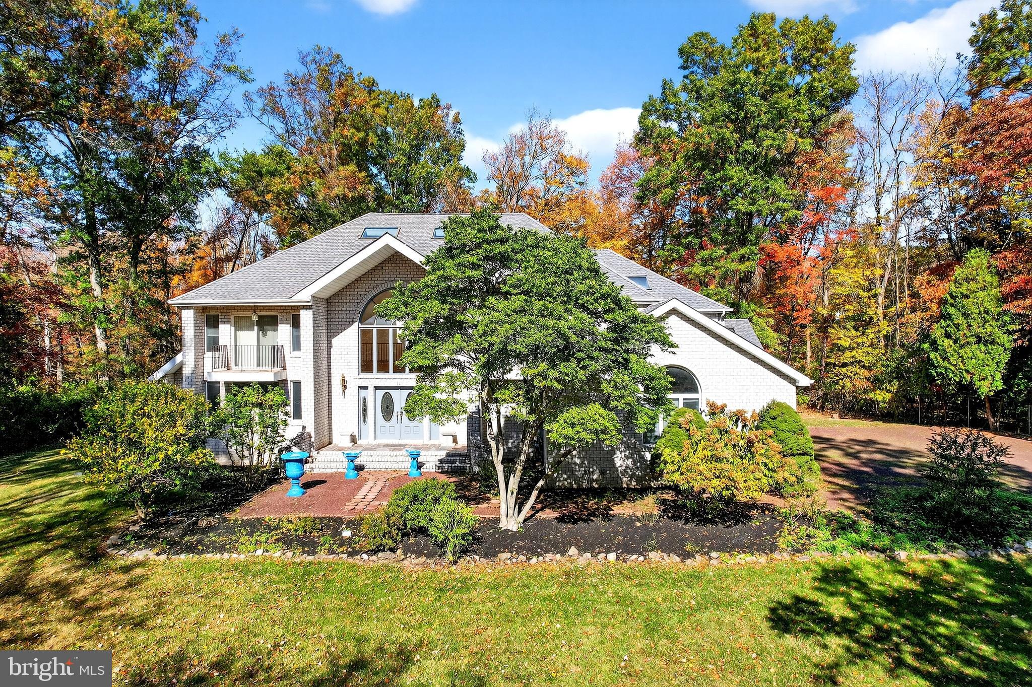 16 Benedek Road Princeton, NJ 08540 - Photo 4 of 60 a front view of a house with garden