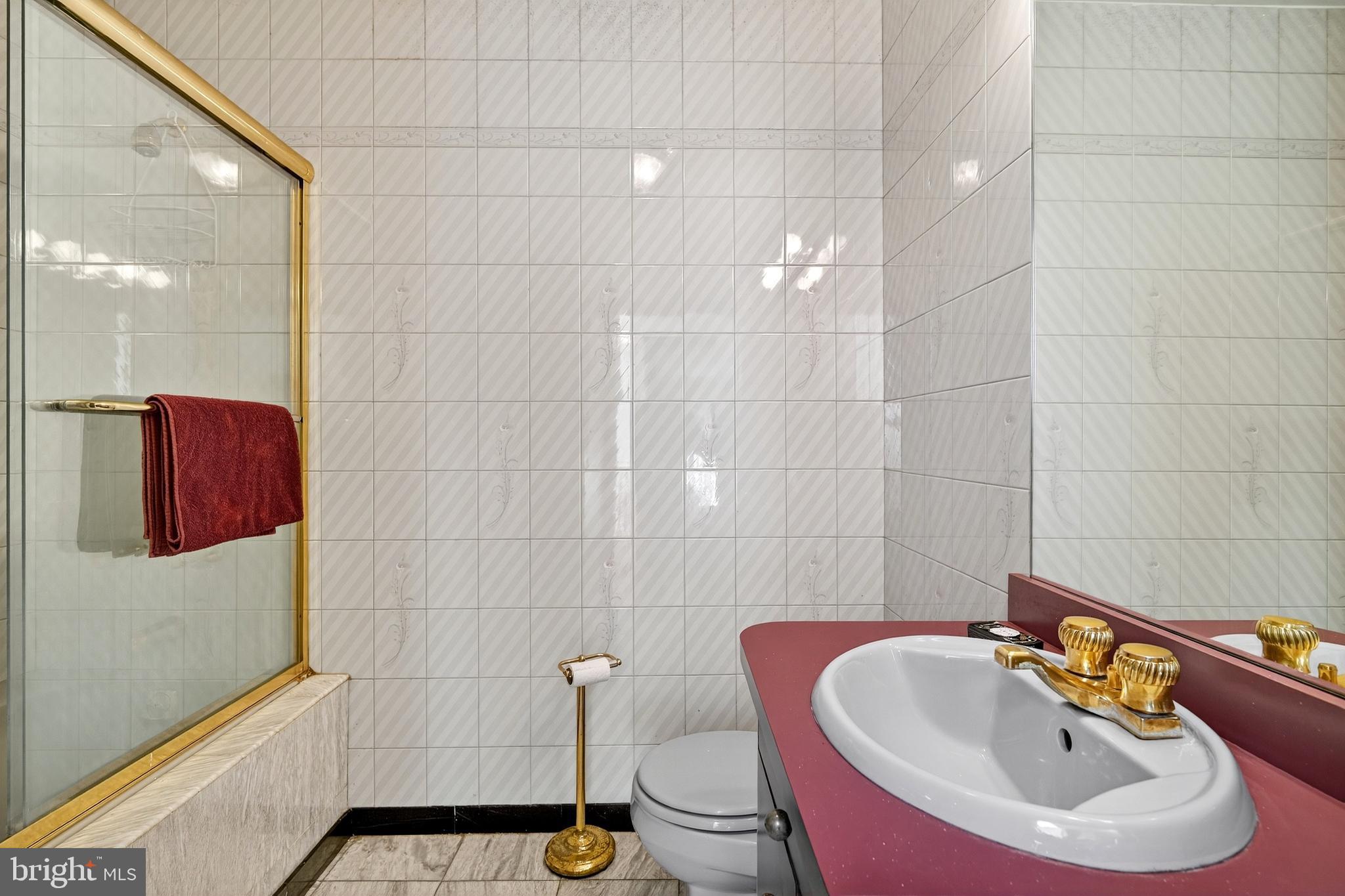 16 Benedek Road Princeton, NJ 08540 - Photo 45 of 60 a bathroom with a sink and a mirror