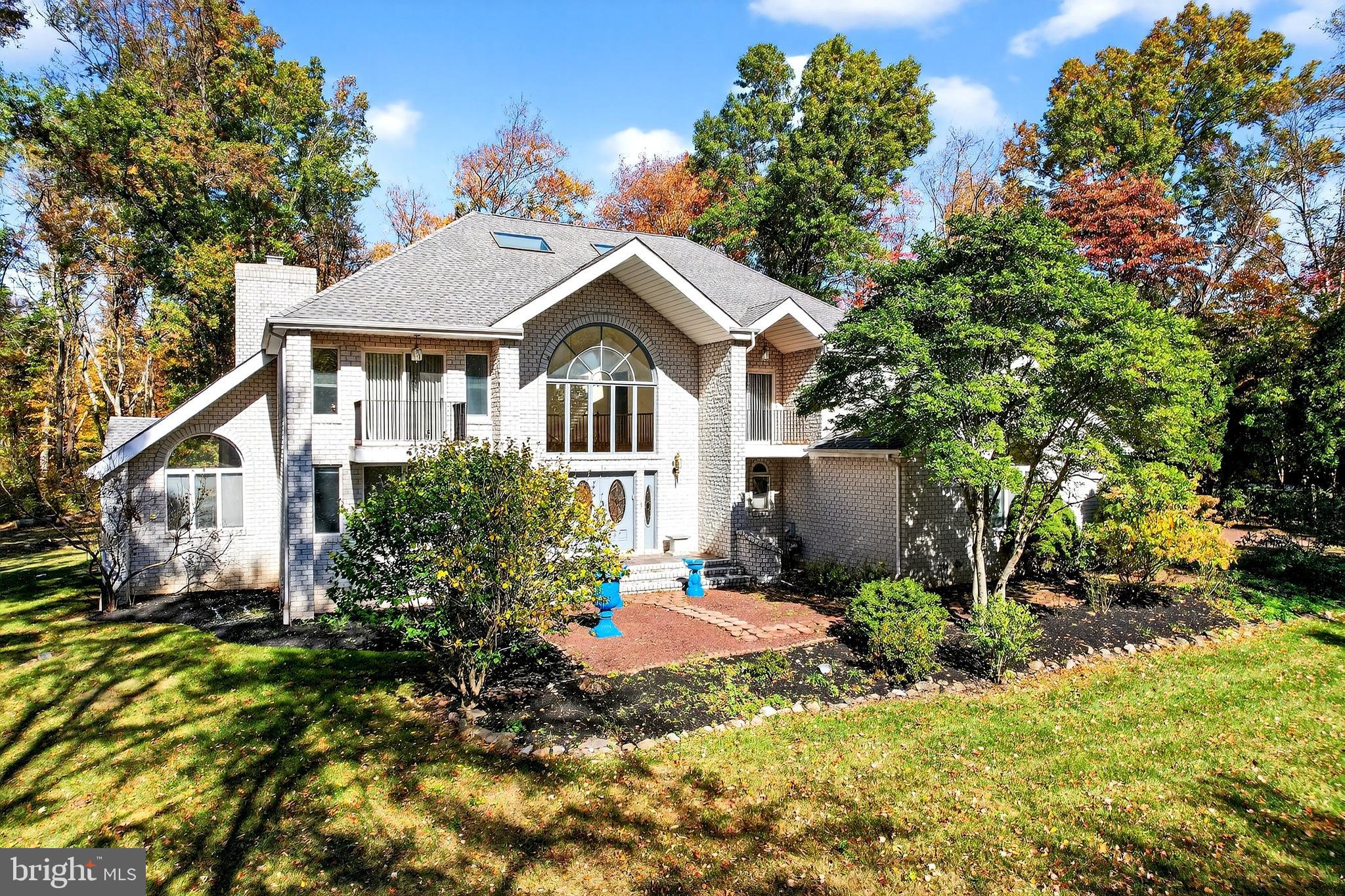 16 Benedek Road Princeton, NJ 08540 - Photo 5 of 60 a front view of a house with a yard