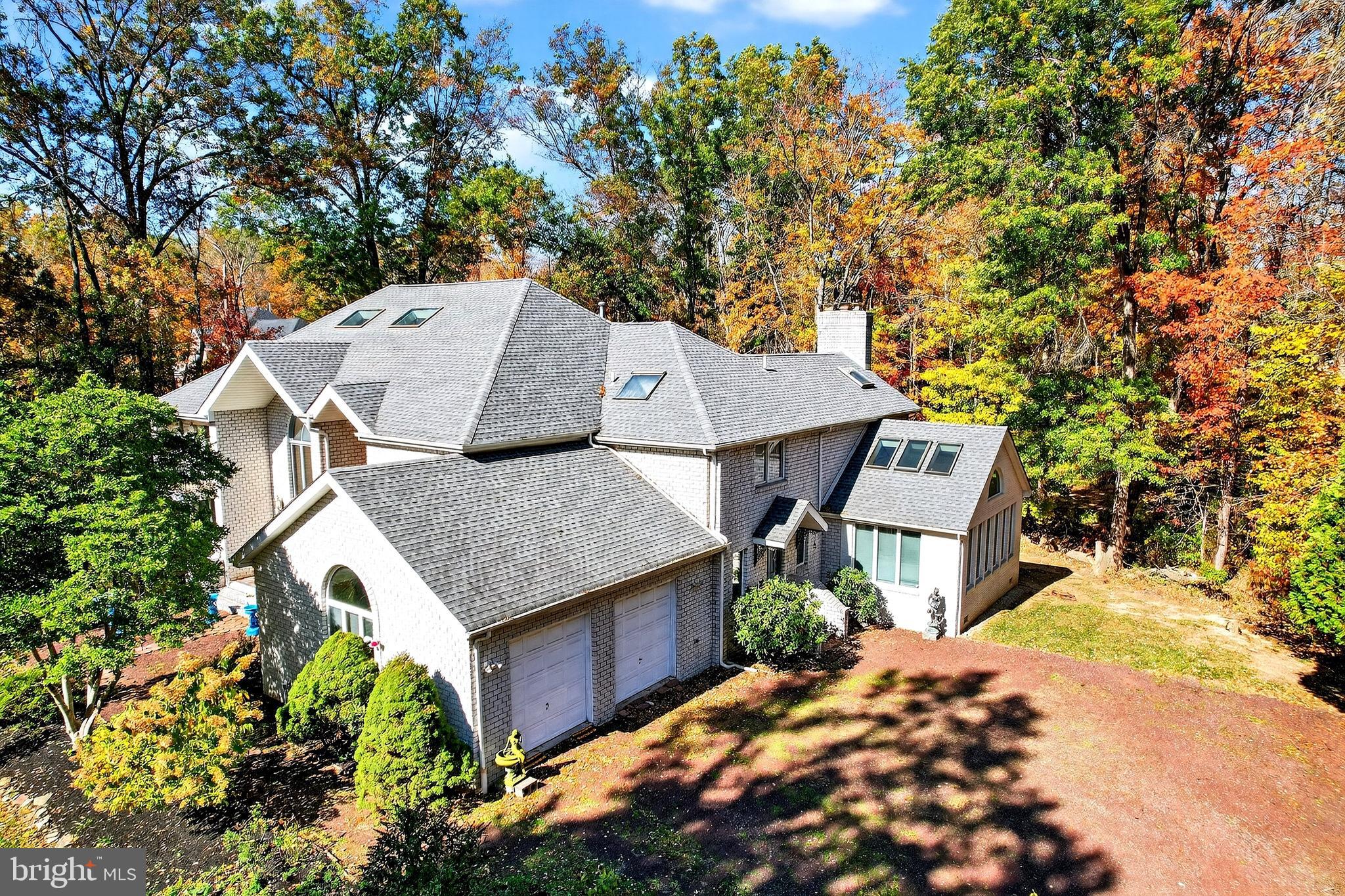 16 Benedek Road Princeton, NJ 08540 - Photo 52 of 60 a view of a house with a yard and large tree