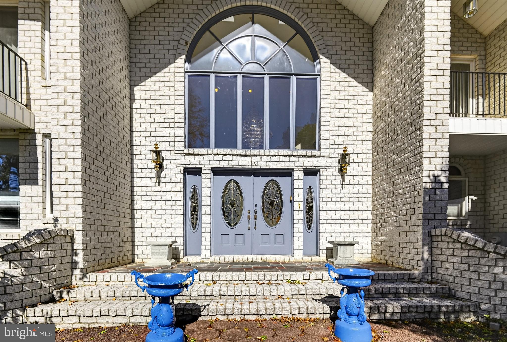 16 Benedek Road Princeton, NJ 08540 - Photo 6 of 60 a front view of a house with wooden fence